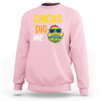 Kids Easter sweatshirt in light pink with “CHICKS DIG ME” and chick egg graphic