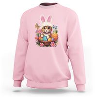 Light pink sweatshirt with colorful Easter bunny cat graphic and eggs basket at chest