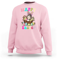 Light pink Easter sweatshirt with cute bunny-cat holding an egg basket graphic