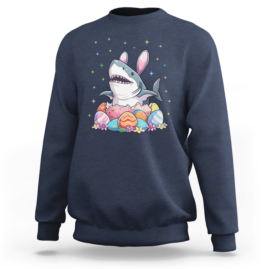 Navy crewneck sweatshirt with cute shark-and-bunny Easter egg graphic on chest.