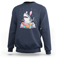 Navy crewneck sweatshirt with cute shark-and-bunny Easter egg graphic on chest.