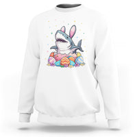White crewneck sweatshirt with cute shark-and-bunny Easter egg graphic on chest.