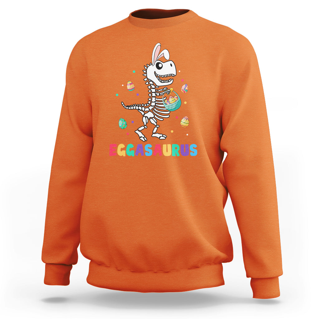 Orange Easter dinosaur graphic sweatshirt with bunny eggasaurus illustration on front