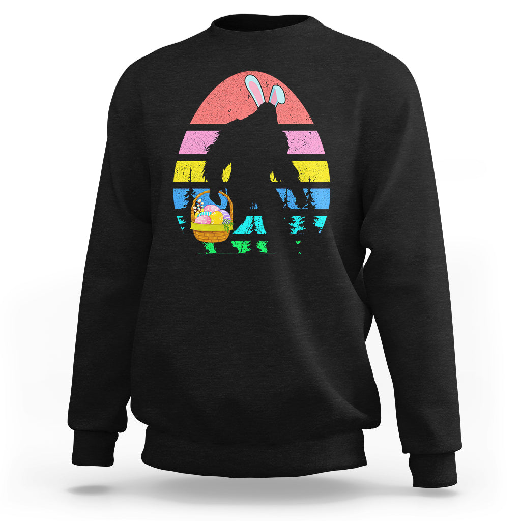 Black crewneck sweatshirt with Bigfoot bunny Easter egg graphic on the front