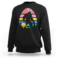 Black crewneck sweatshirt with Bigfoot bunny Easter egg graphic on the front