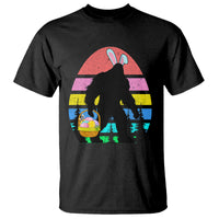 Black crewneck graphic T-shirt with Bigfoot silhouette holding an Easter basket