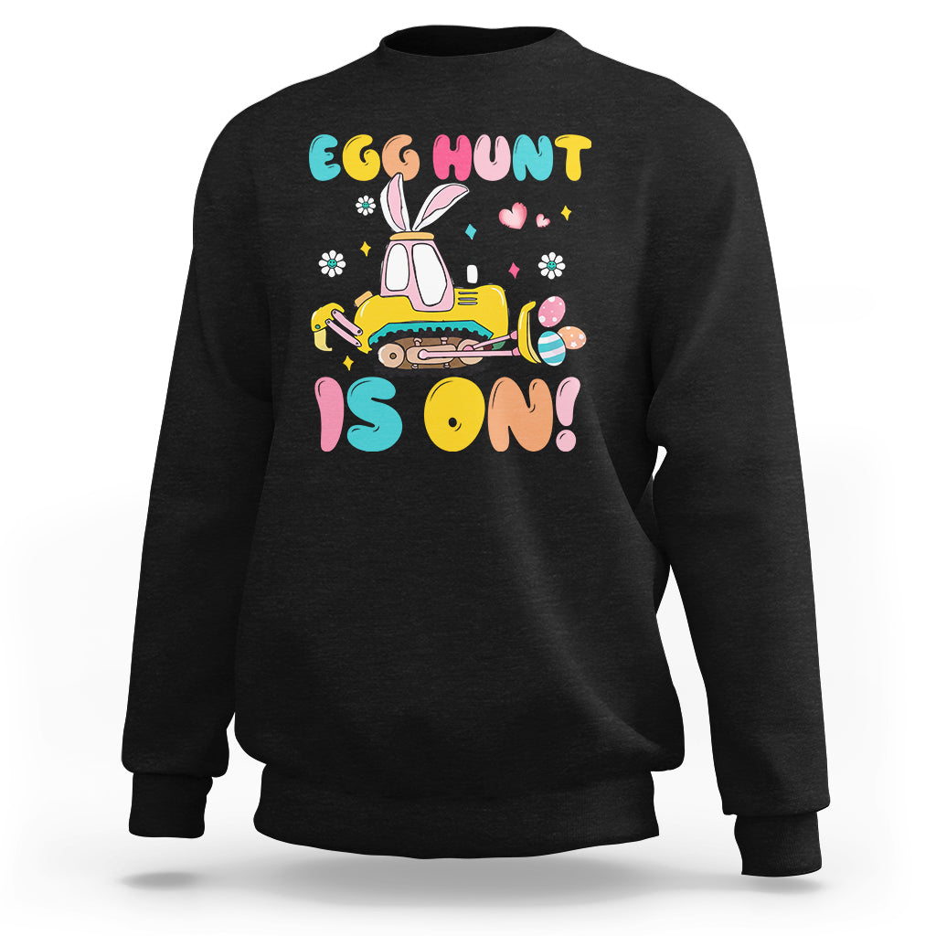 Black Easter egg hunt sweatshirt with bunny tractor graphic and colorful text