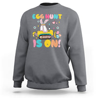 Charcoal gray Easter egg hunt sweatshirt with bunny tractor graphic and colorful text