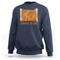 Blue crewneck sweatshirt with vintage world map scroll graphic and “Travel is Life” text