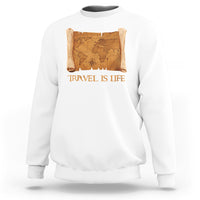 White crewneck sweatshirt with vintage world map scroll graphic and “Travel is Life” text
