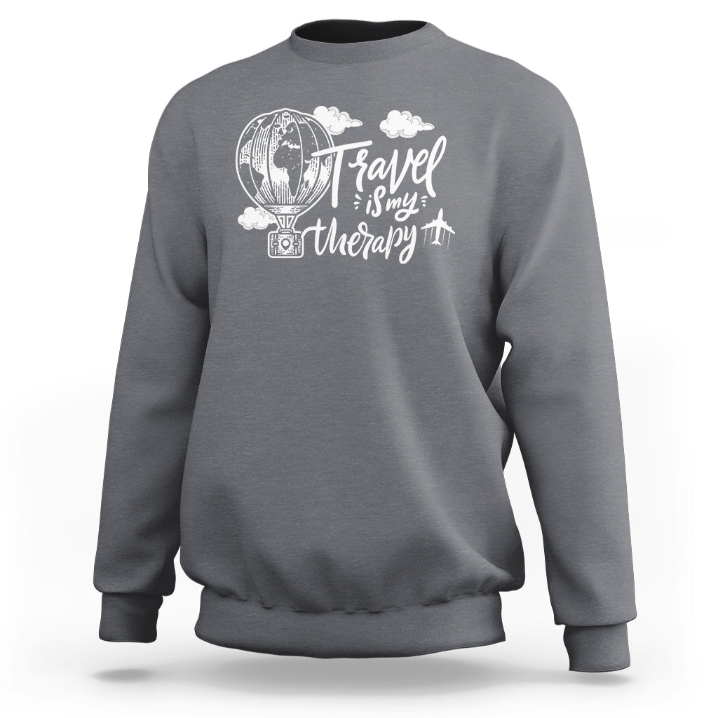 Charcoal gray crewneck sweatshirt with white travel hot-air balloon graphic and text