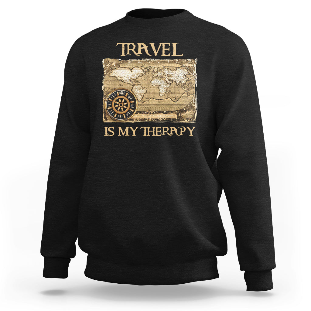 Black travel-themed sweatshirt with vintage world map and compass graphic, front view