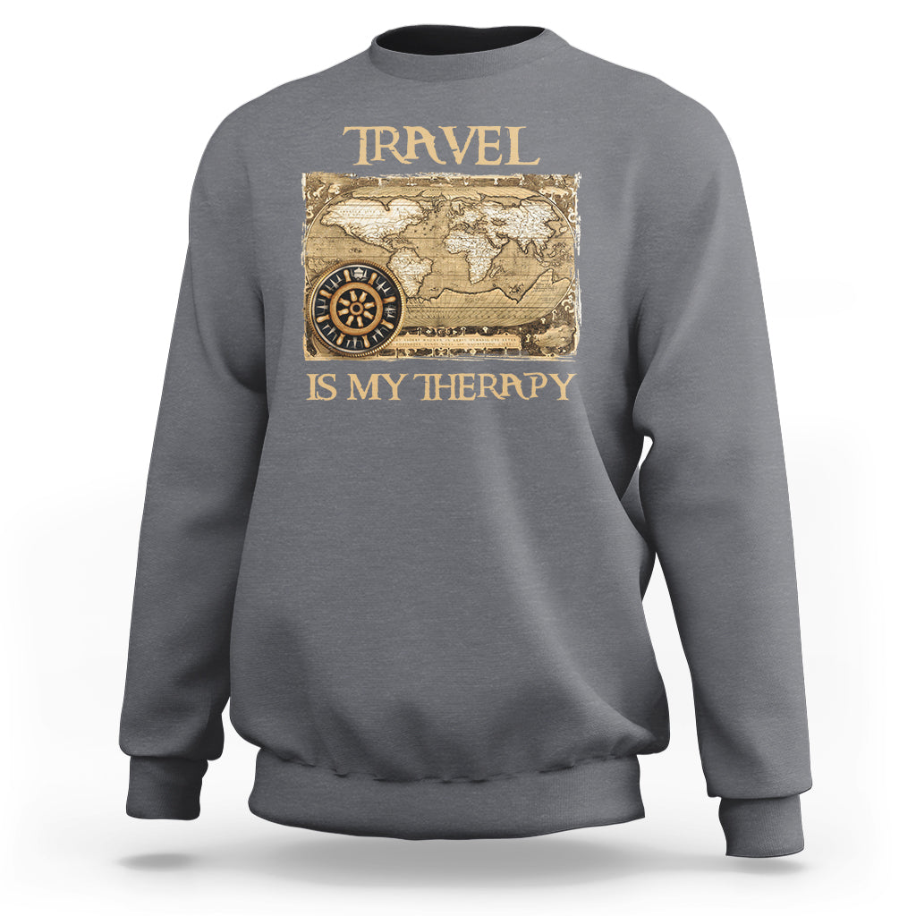 Dark forest green travel-themed sweatshirt with vintage world map and compass graphic