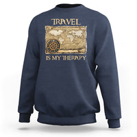 Navy travel-themed sweatshirt with vintage world map and compass graphic, front view
