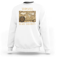 White travel-themed sweatshirt with vintage world map and compass graphic, front view
