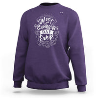 Purple crewneck sweatshirt with white 'Most Expensive Day Ever' graphic on chest