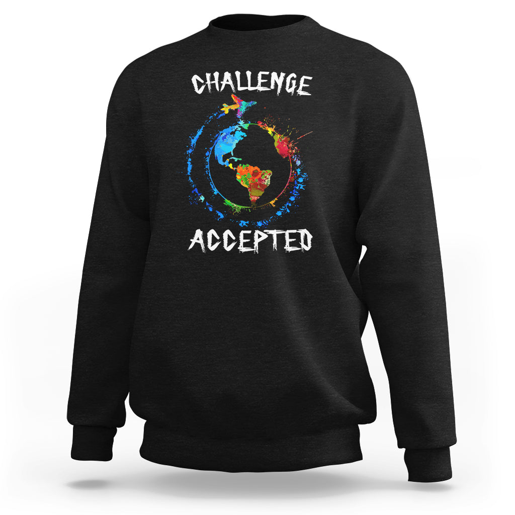 Black crewneck sweatshirt with globe graphic and "CHALLENGE ACCEPTED" print