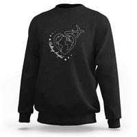 Black crewneck sweatshirt with white globe, airplane, and heart graphic on chest
