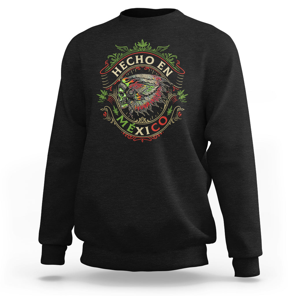 Black crewneck sweatshirt with colorful Hecho En Mexico skull graphic on chest