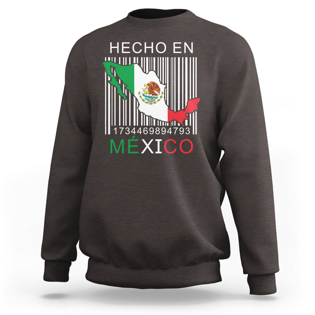 Dark chocolate crewneck sweatshirt with 'HECHO EN MEXICO' barcode flag graphic on chest