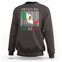 Dark chocolate crewneck sweatshirt with 'HECHO EN MEXICO' barcode flag graphic on chest