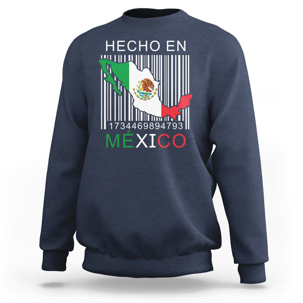 Navy crewneck sweatshirt with 'HECHO EN MEXICO' barcode flag graphic on chest
