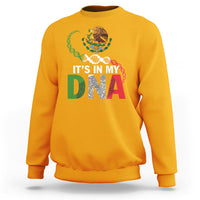 Gold sweatshirt with front "IT'S IN MY DNA" graphic and colorful DNA helix.