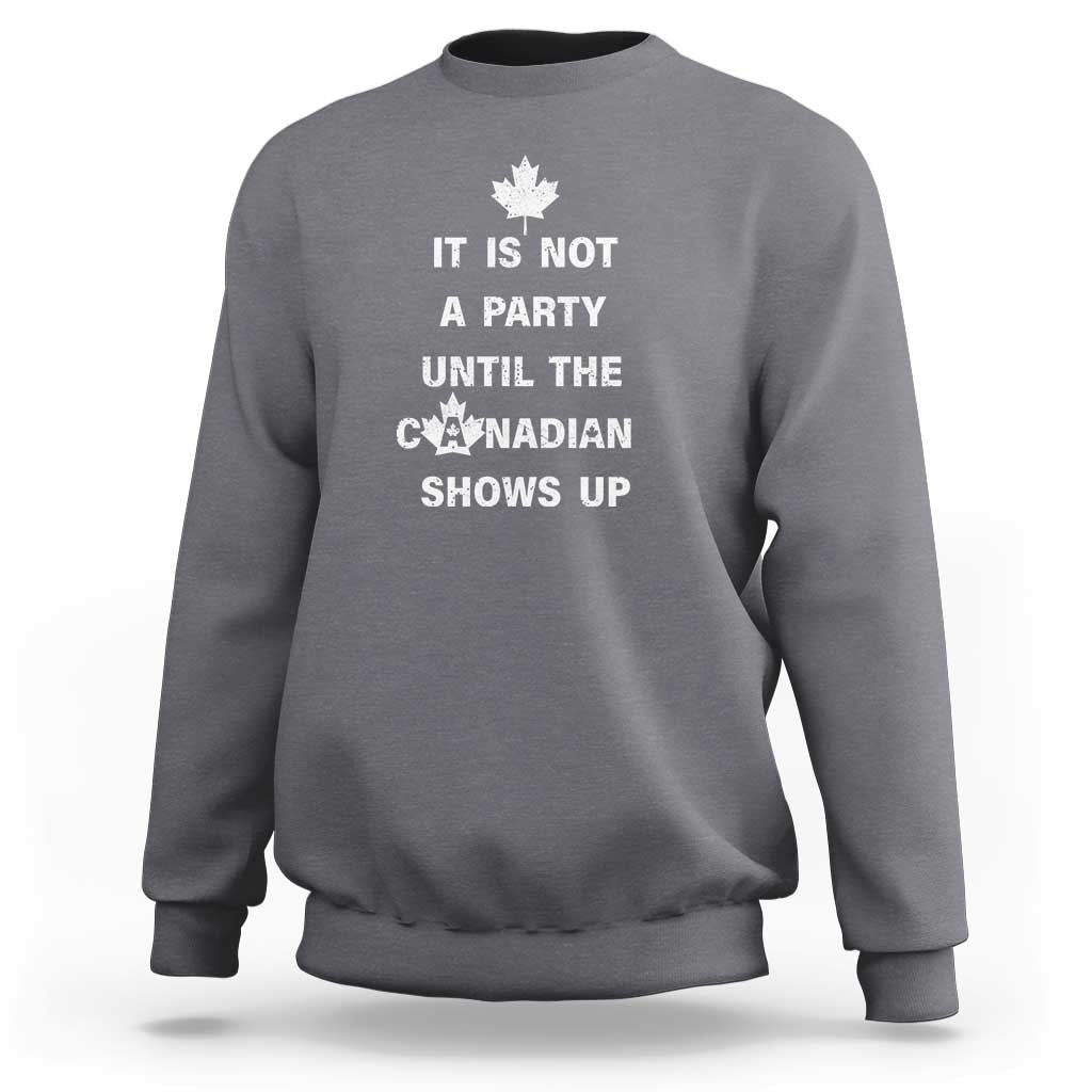 Gray crewneck sweatshirt with white Canadian shows up graphic and maple leaf