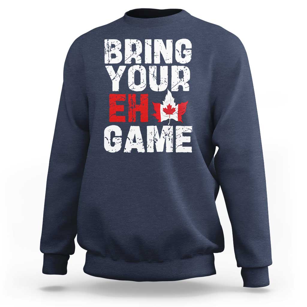 Navy sweatshirt with “Bring Your Eh Game” Canada flag and maple leaf graphic