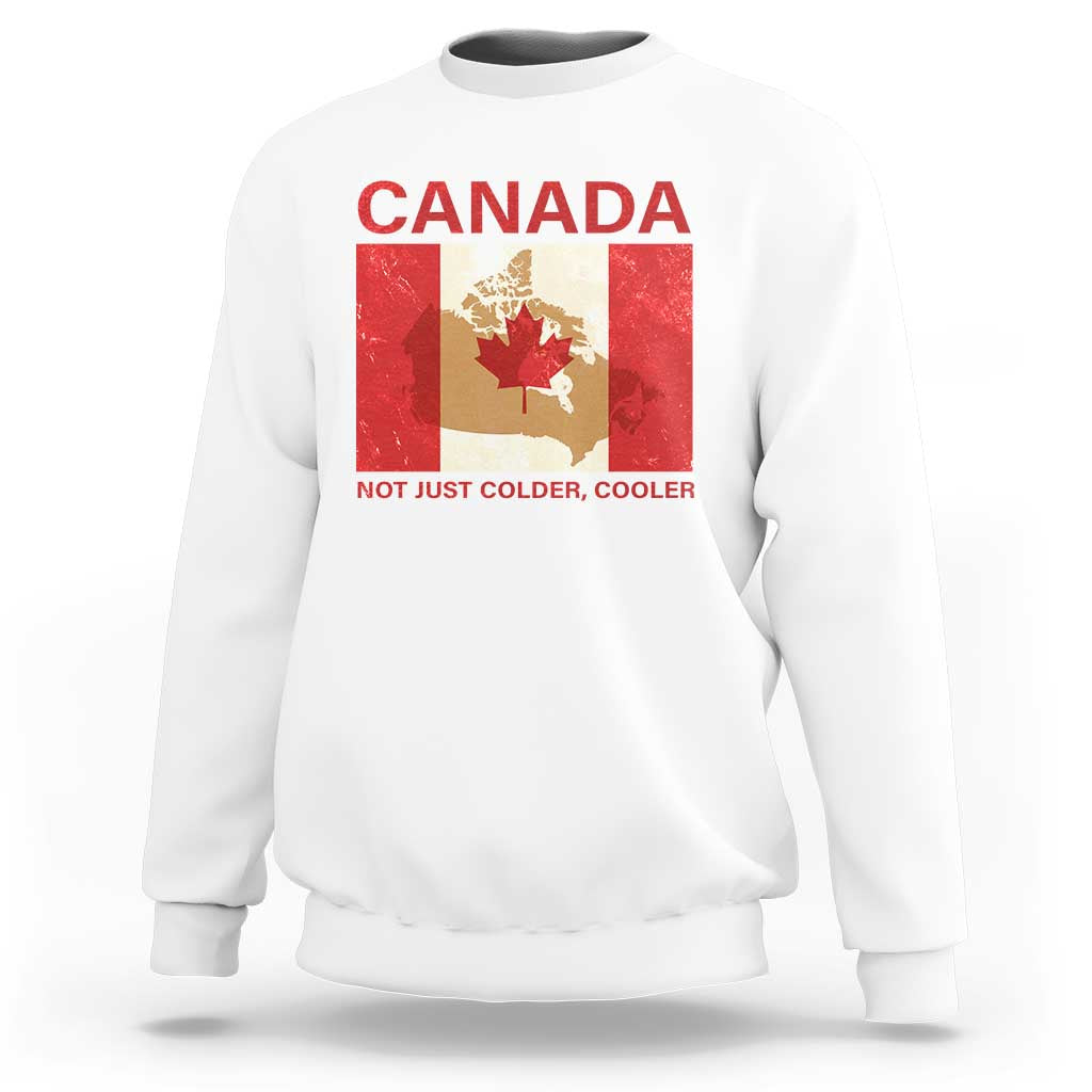 White crewneck sweatshirt with “CANADA” graphic and “NOT JUST COLDER, COOLER” text