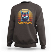 Unisex charcoal brown sweatshirt with CATNADA cat sunglasses graphic on the front.