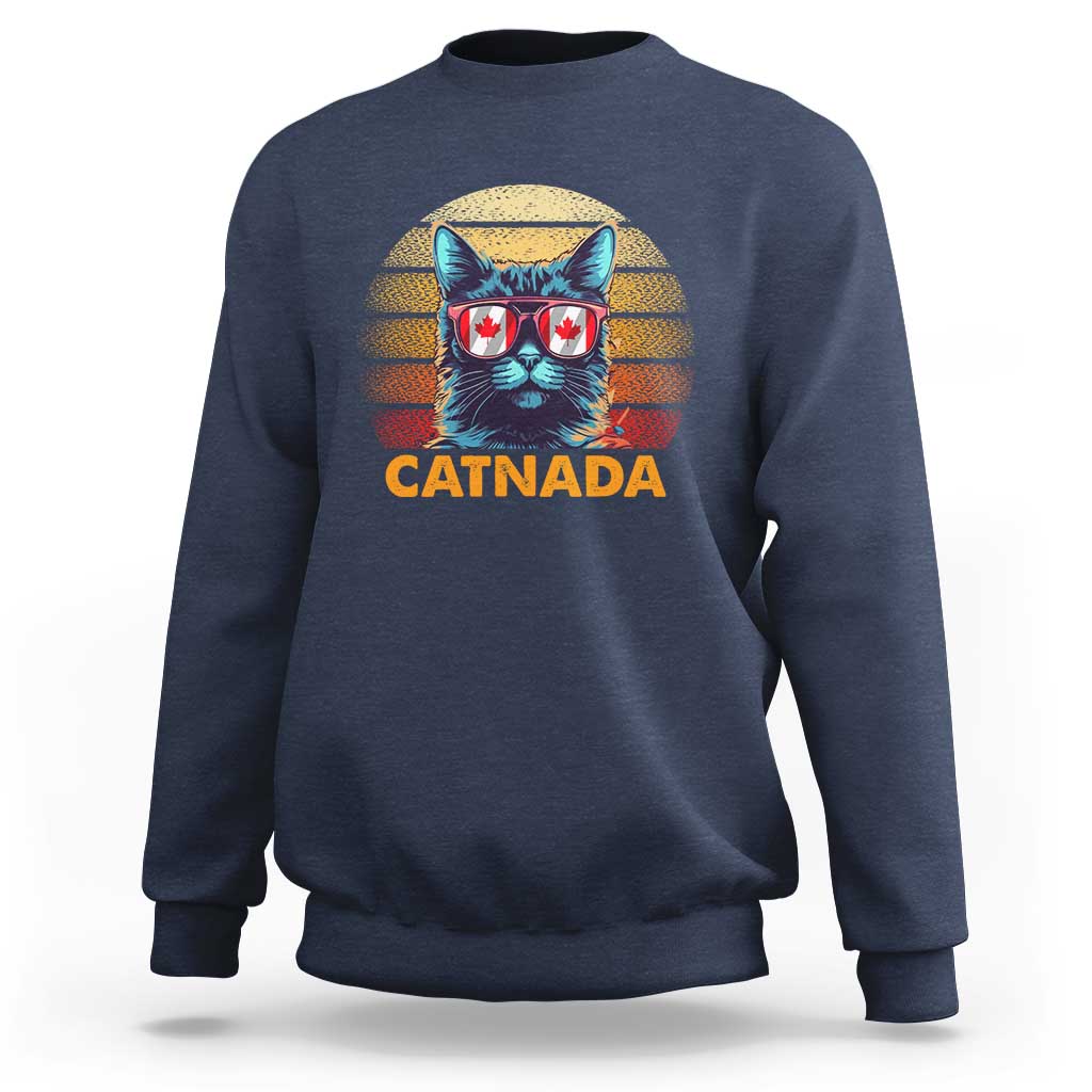Unisex navy sweatshirt with CATNADA cat sunglasses graphic on the front.