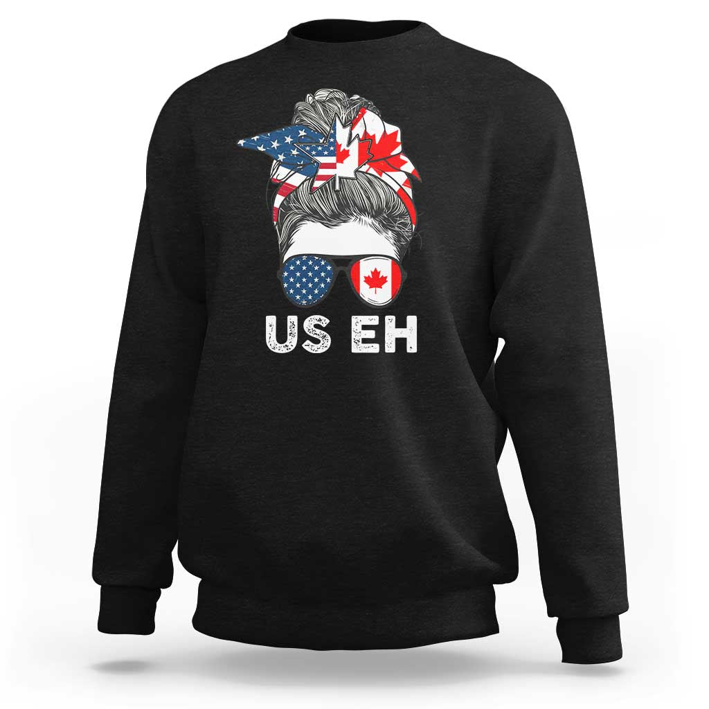 Black crewneck sweatshirt with US EH graphic and Canada–US flag hair illustration