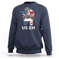 Navy crewneck sweatshirt with US EH graphic and Canada–US flag hair illustration