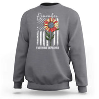 Charcoal crewneck sweatshirt with American flag sunflower graphic on front