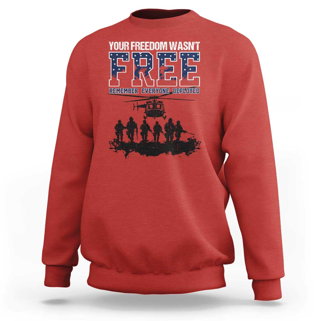 Red crewneck sweatshirt with front “Free” graphic and deployed memorial text