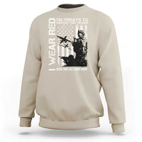 Beige sweatshirt with patriotic front graphic and long sleeves