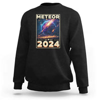 Black astronomy sweatshirt with “Meteor 2024” back graphic