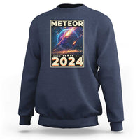 Navy astronomy sweatshirt with “Meteor 2024” back graphic