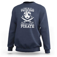 Navy crewneck sweatshirt with long sleeves and white “Princess” pirate graphic on back
