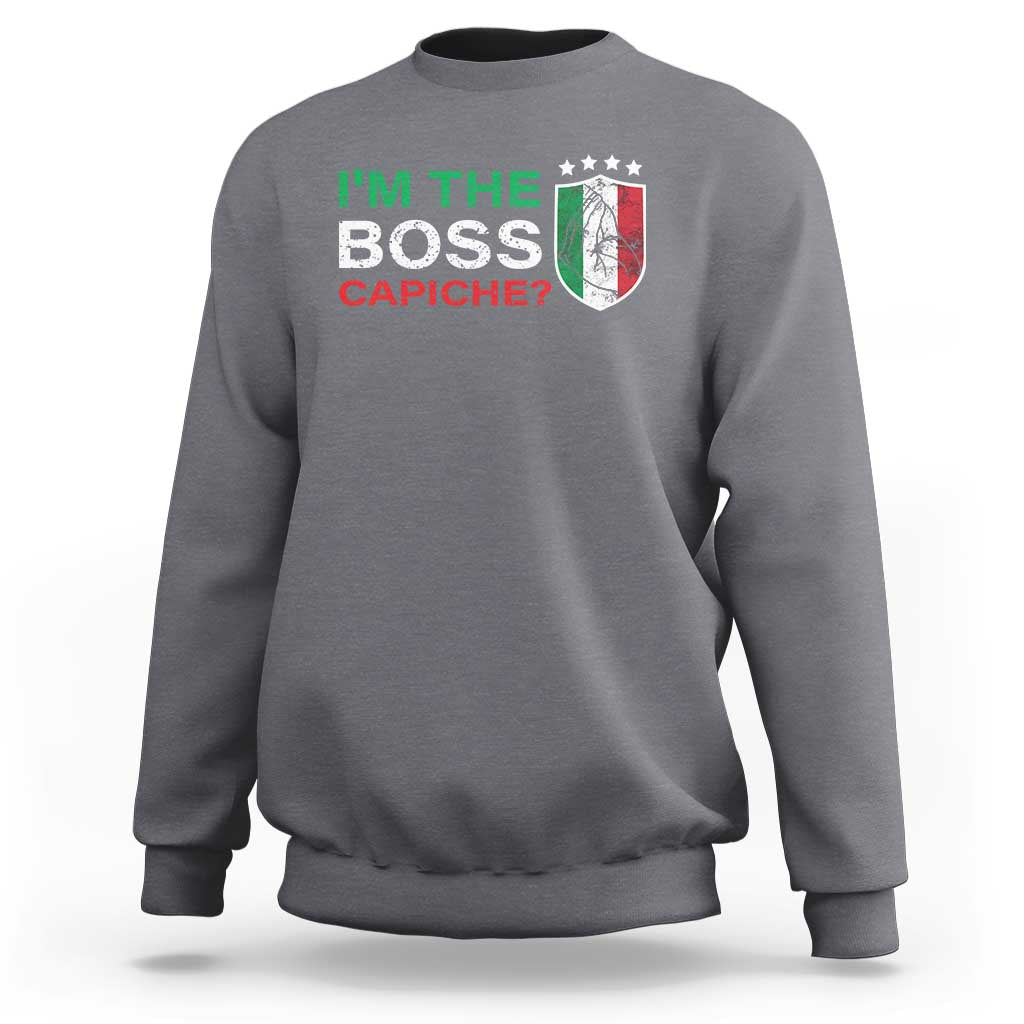Charcoal crewneck sweatshirt with "I'm the Boss Capiche?" graphic on chest
