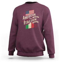 Maroon sweatshirt with large Italian roots and U.S. flag graphic on back