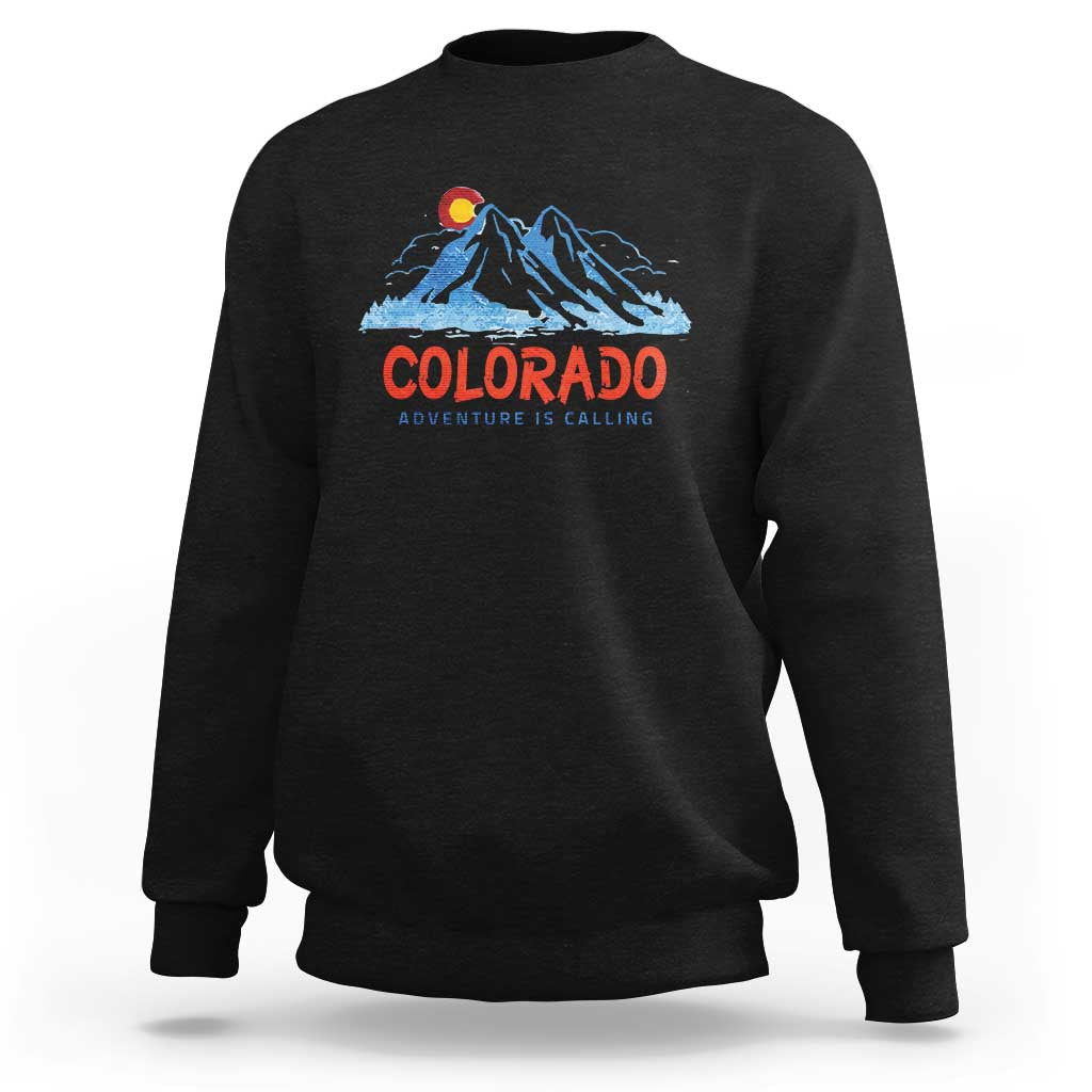 Black crewneck sweatshirt with Colorado mountain graphic and 'Adventure Is Calling' print