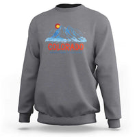 Gray crewneck sweatshirt with Colorado mountain graphic and 'Adventure Is Calling' print
