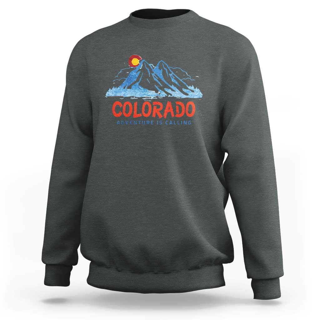 Charcoal crewneck sweatshirt with Colorado mountain graphic and 'Adventure Is Calling' print