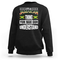 Black crewneck sweatshirt with Jamaican pride graphic text on the front.