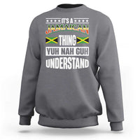 Charcoal crewneck sweatshirt with Jamaican pride graphic text on the front.