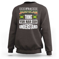 Dark chocolate crewneck sweatshirt with Jamaican pride graphic text on the front.