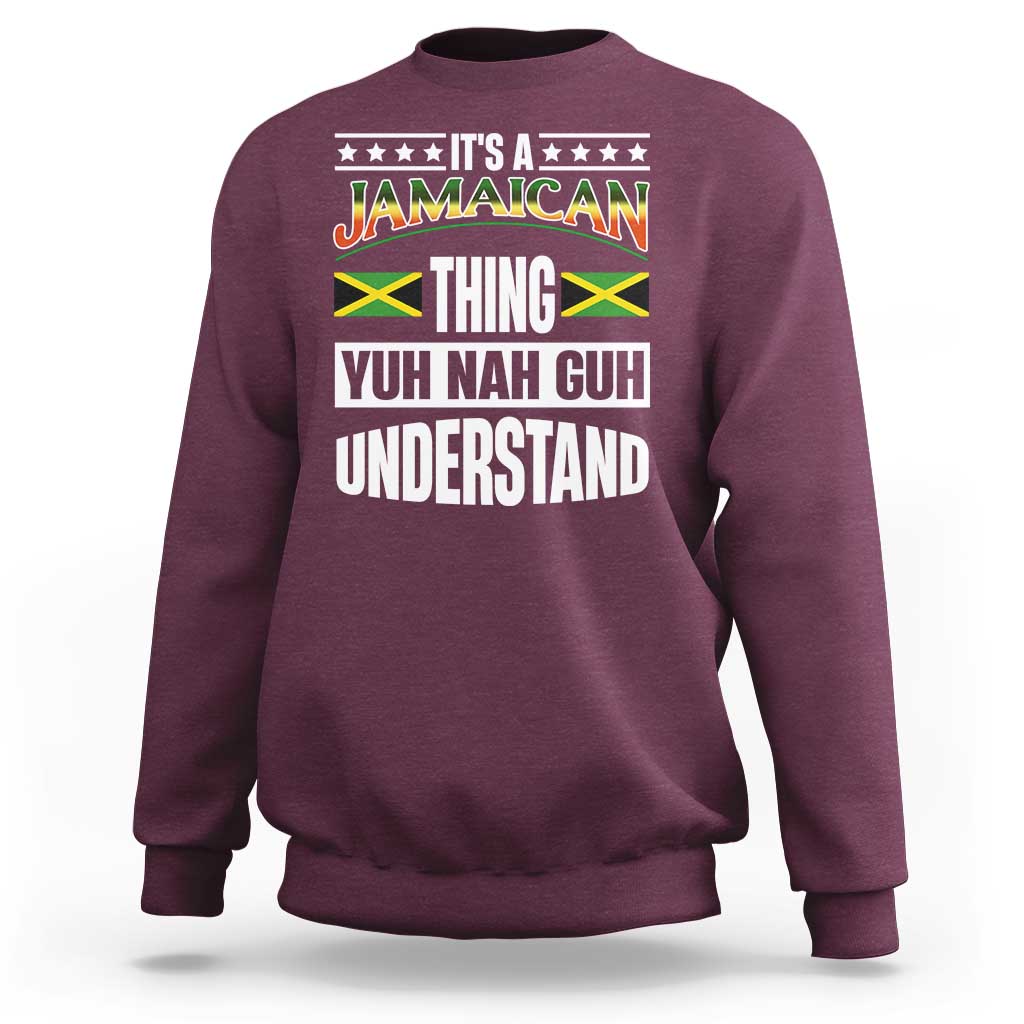 Maroon crewneck sweatshirt with Jamaican pride graphic text on the front.