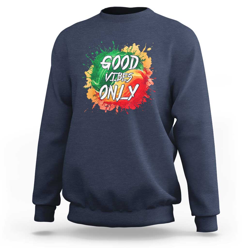 Navy crewneck sweatshirt with colorful “Good Vibes Only” rasta graphic on front